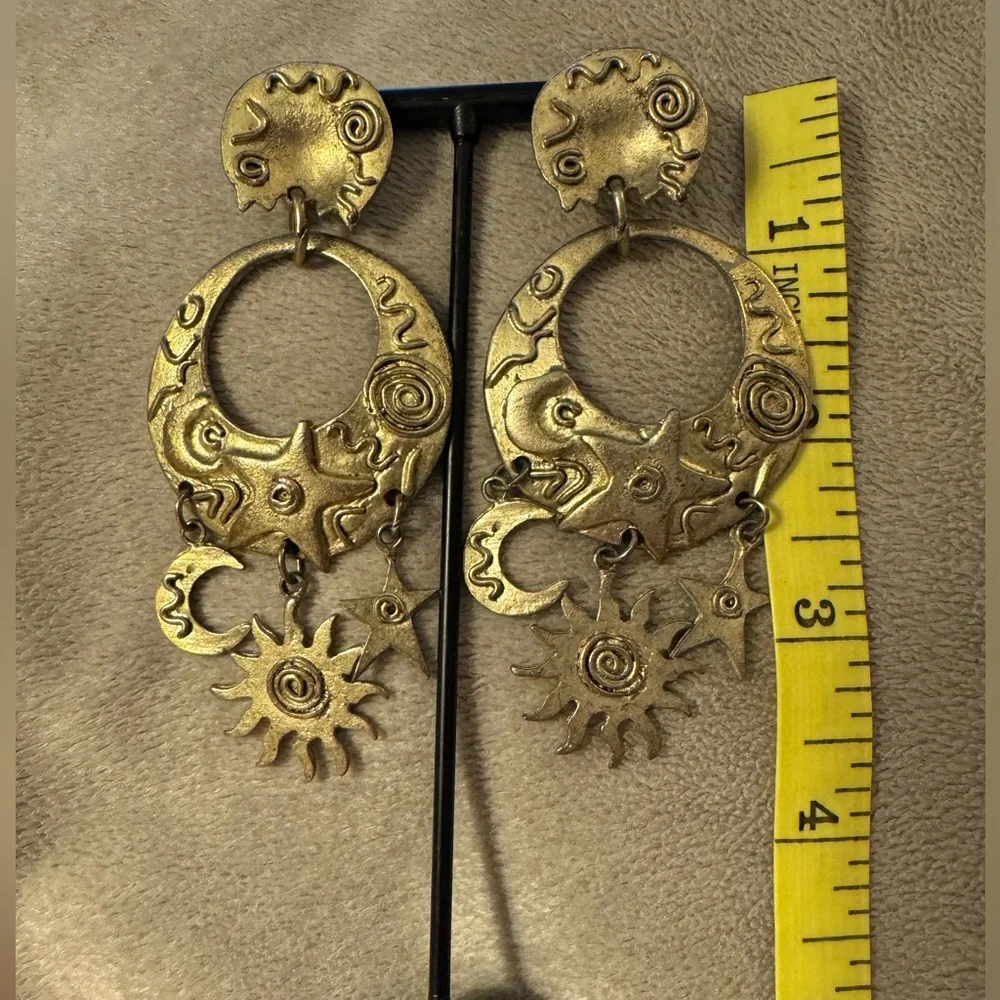 Moon, sun and stars earrings, bronze gold color. EUC, post back.